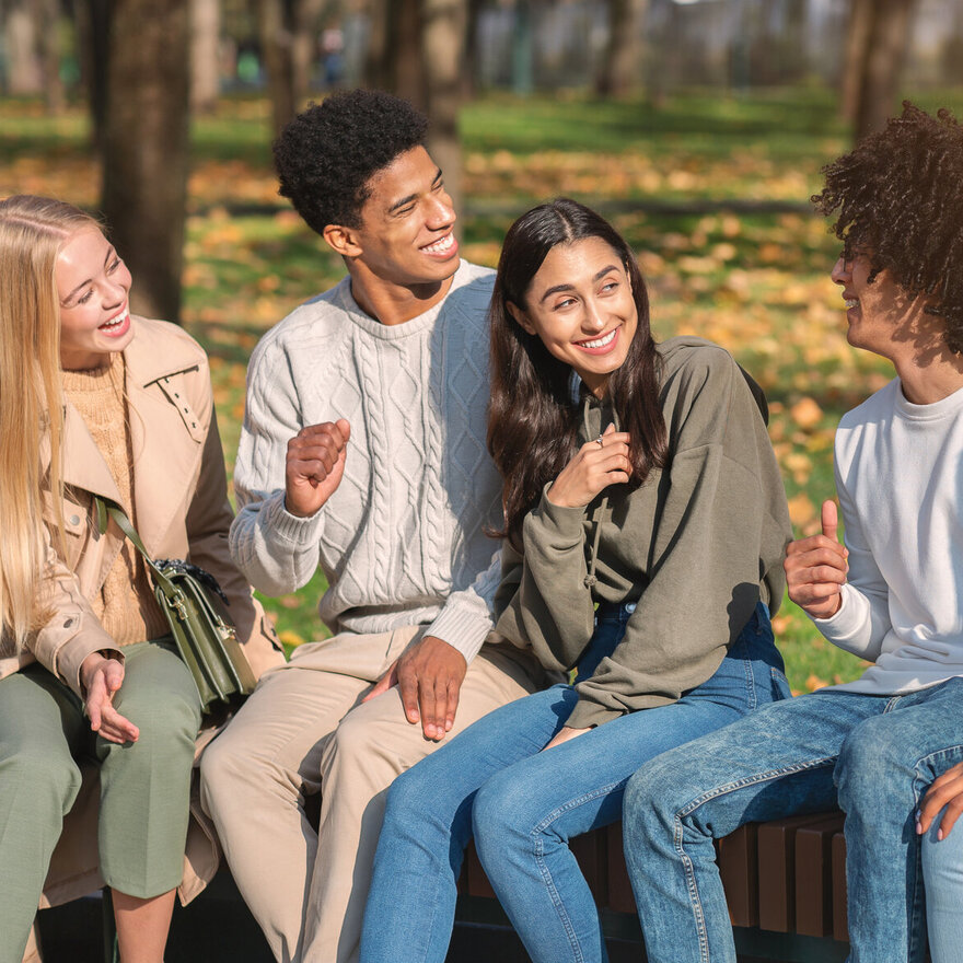 Carefree teenagers having good time at public park
